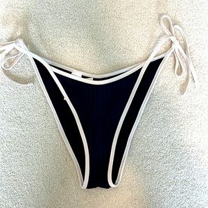 Black cheeky bikini bottoms, white tie details. Size medium aerie brand